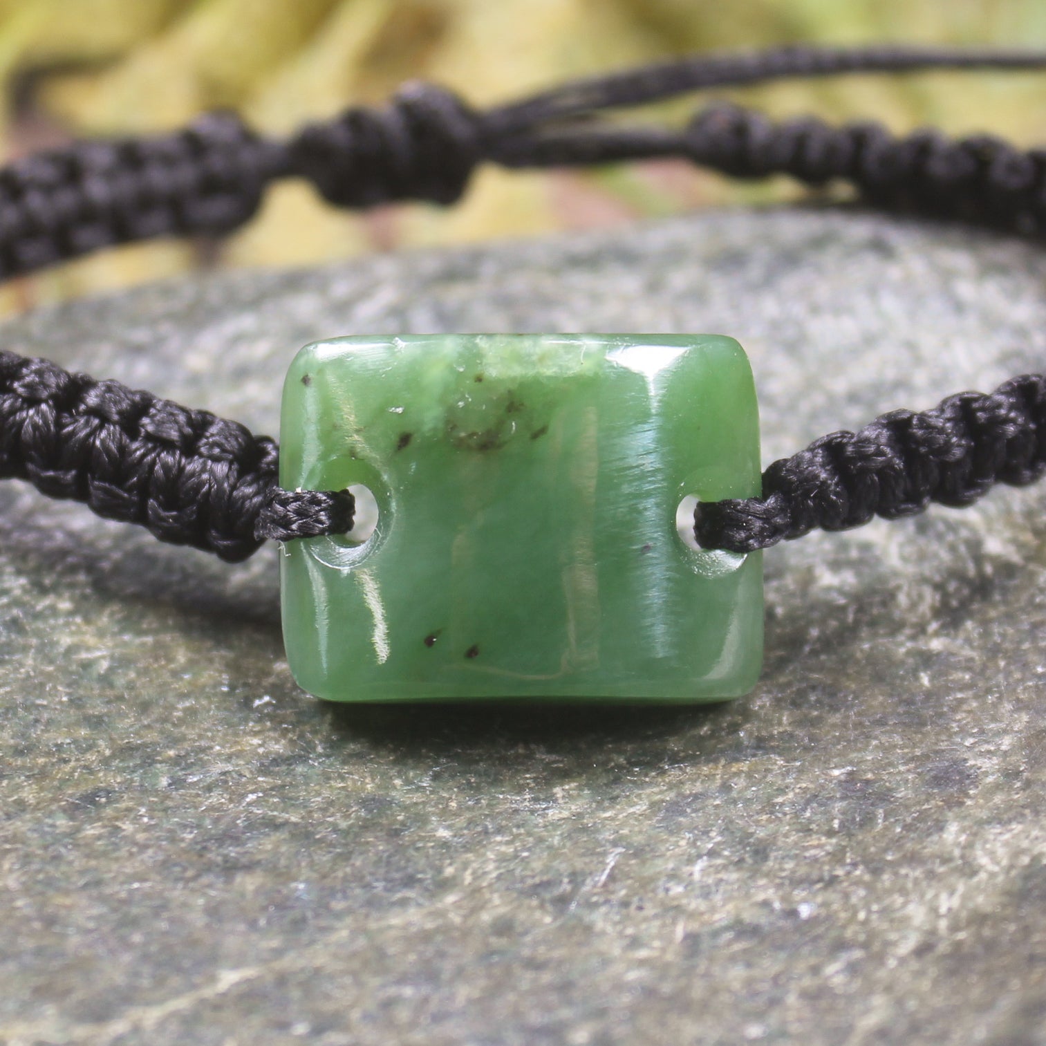 Adjustable cord bracelet with Hapopo Pounamu