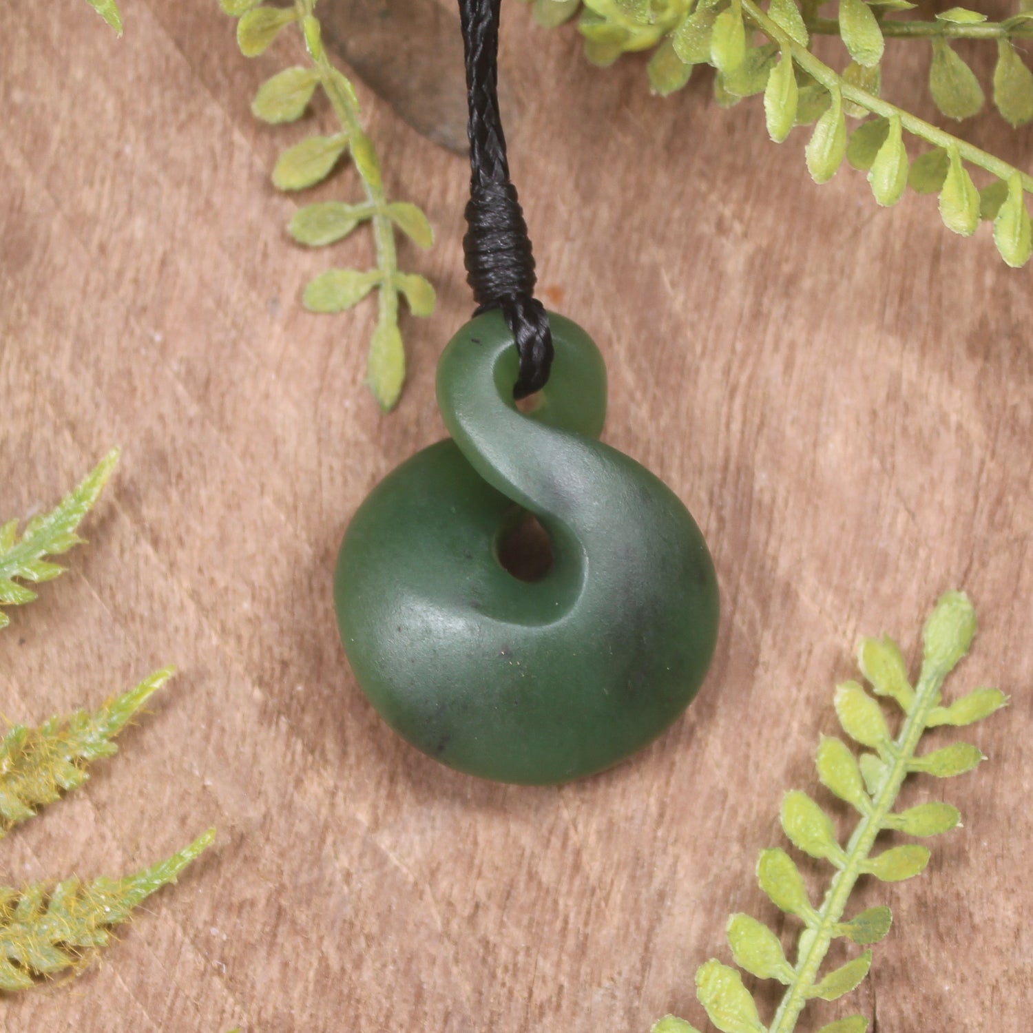Twist or Pikorua carved from Hapopo Pounamu - NZ Greenstone