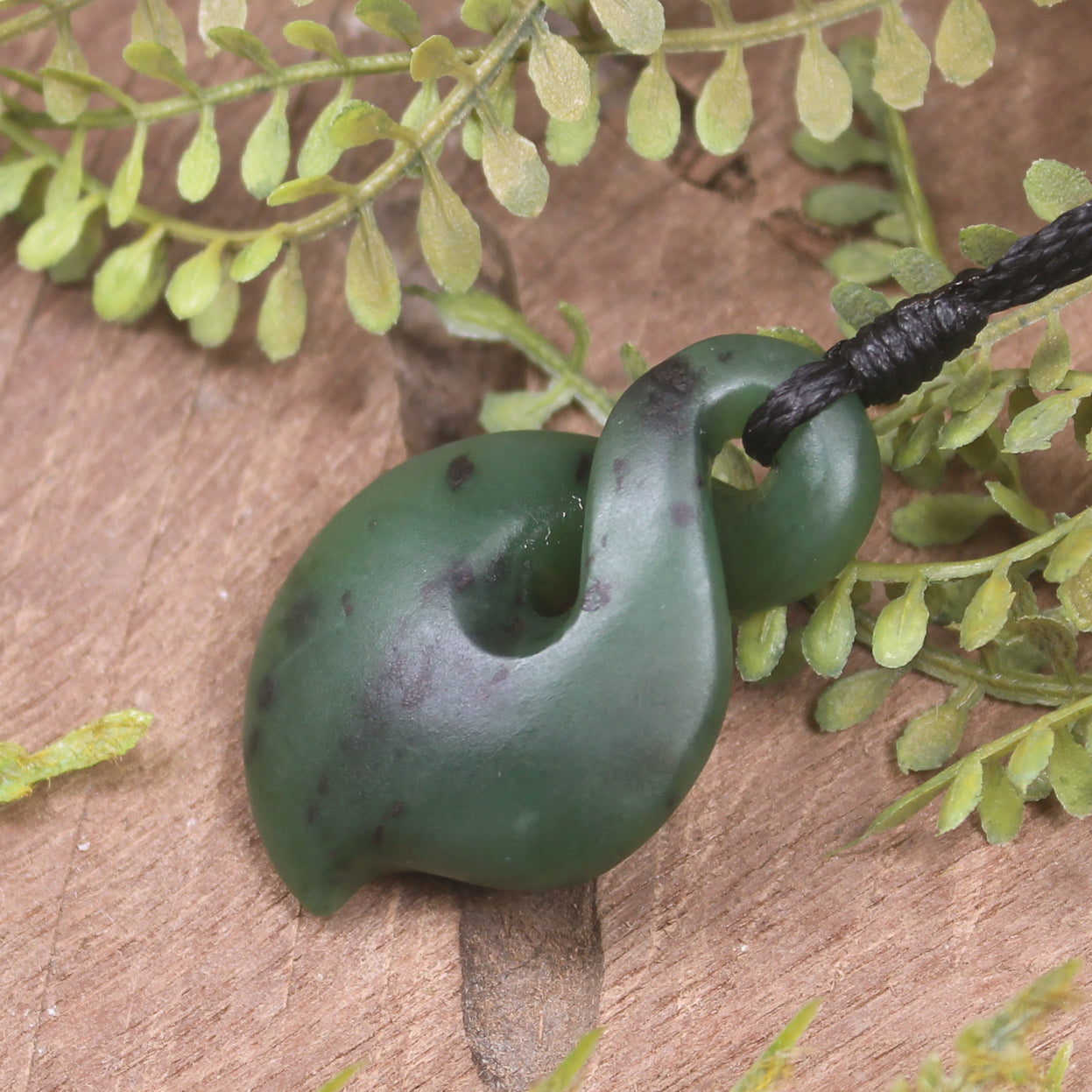 Twist or Pikorua carved from Hapopo Pounamu - NZ Greenstone