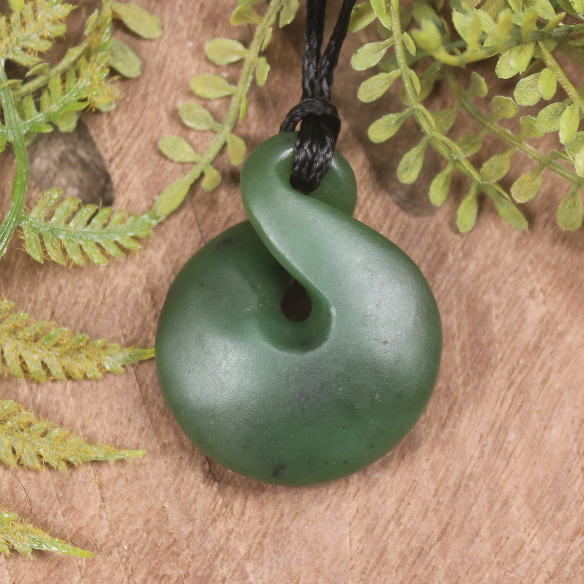 Twist or Pikorua carved from Hapopo Pounamu - NZ Greenstone