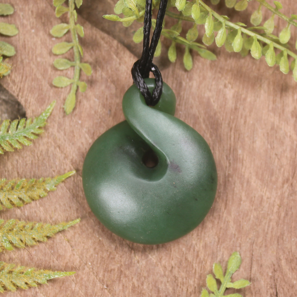 Twist or Pikorua carved from Hapopo Pounamu - NZ Greenstone