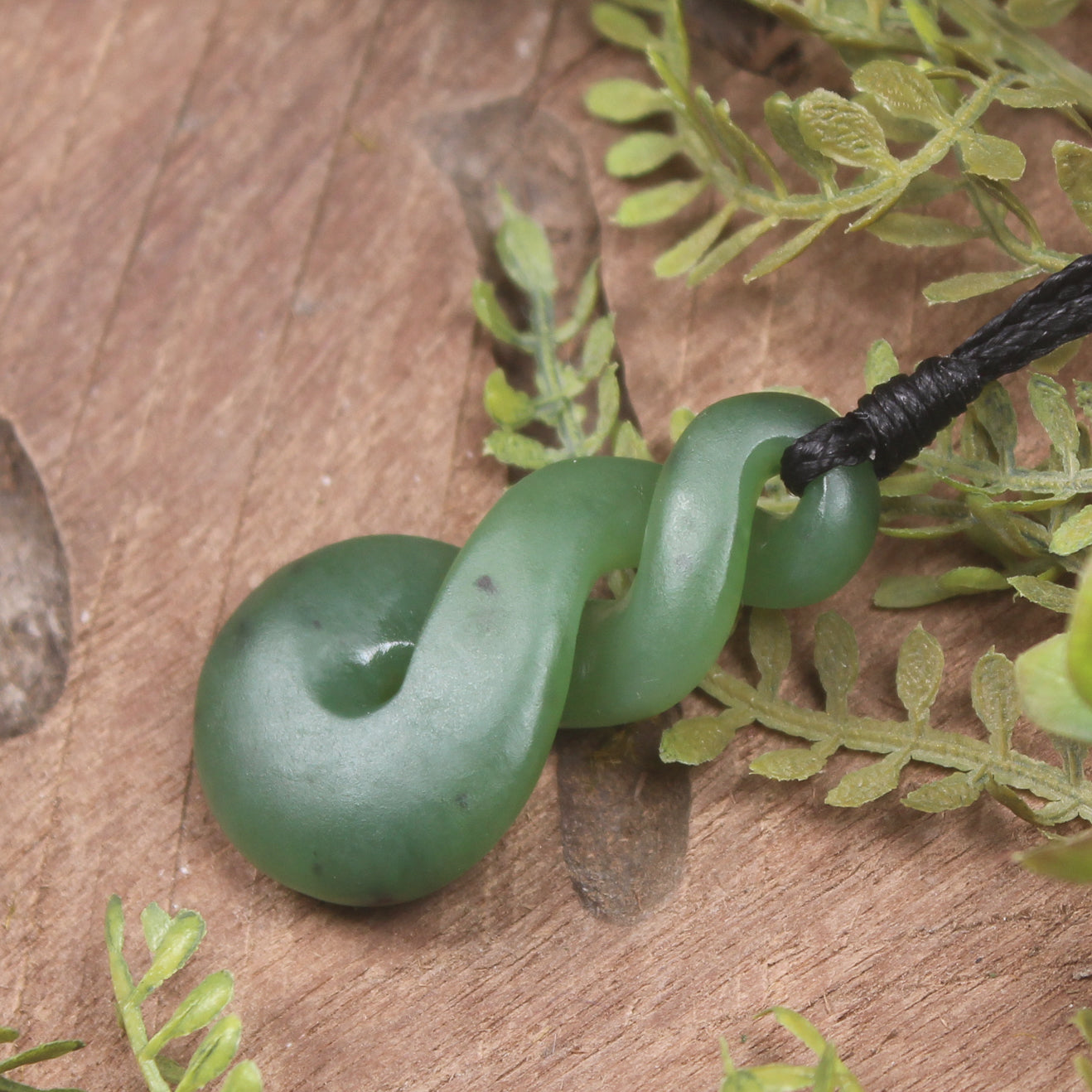 Twist or Pikorua carved from Hapopo Pounamu - NZ Greenstone