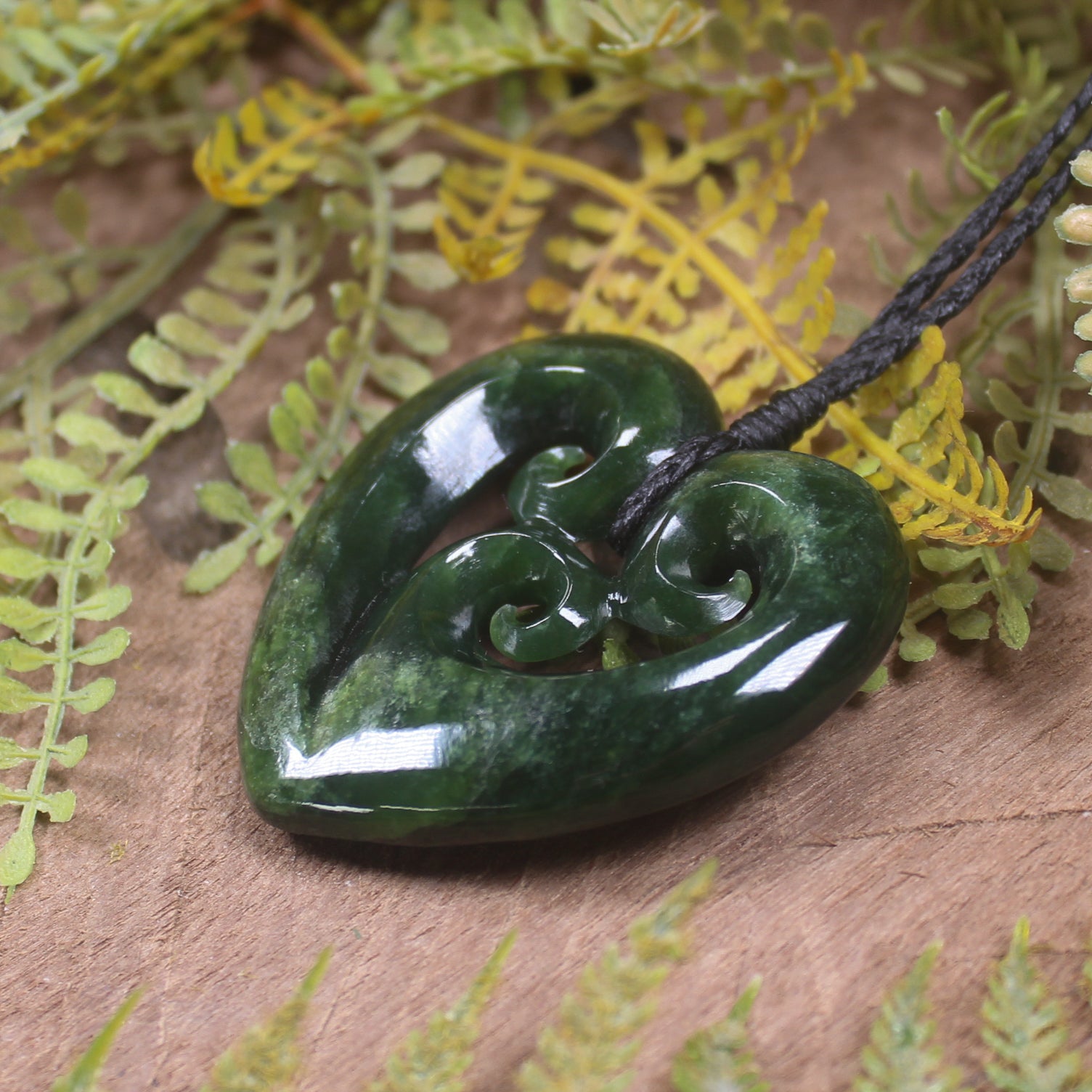 Heart with Koru carved from Kawakawa Pounamu - NZ Greenstone