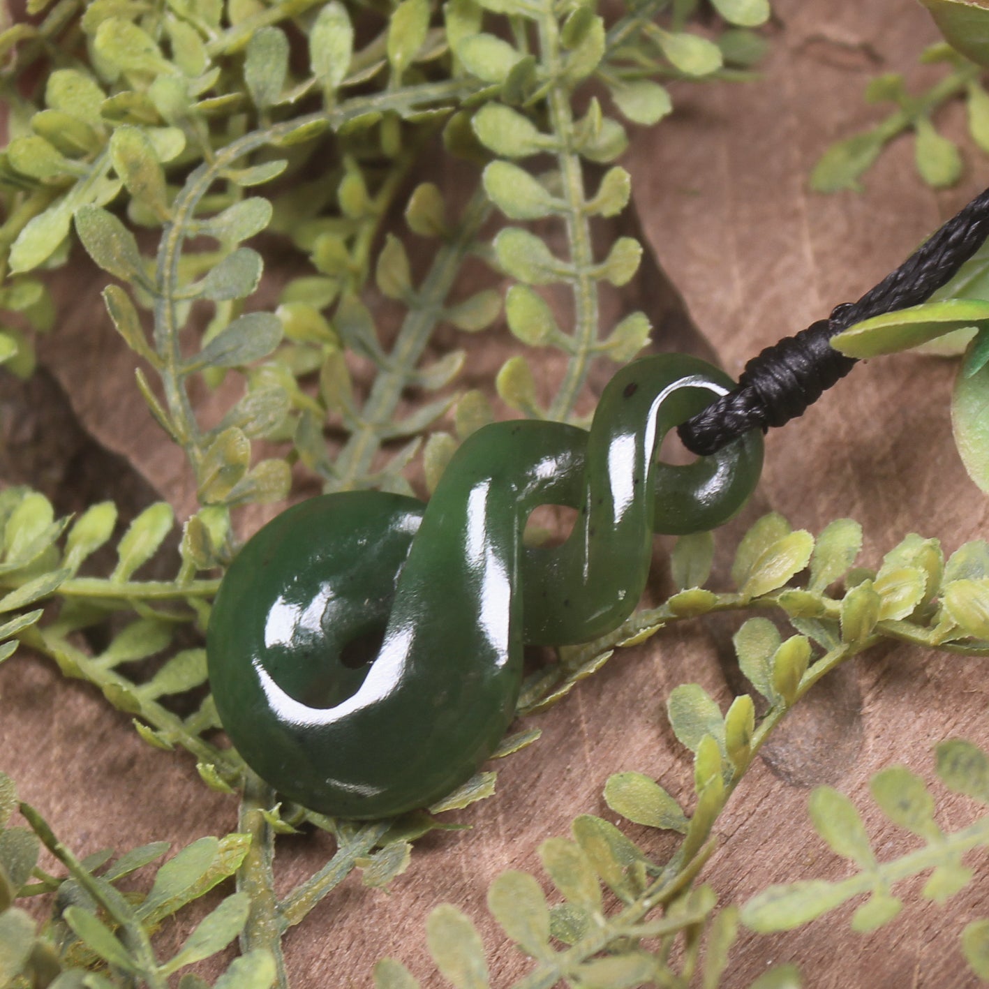 Twist carved from Kawakawa Pounamu - NZ Greenstone