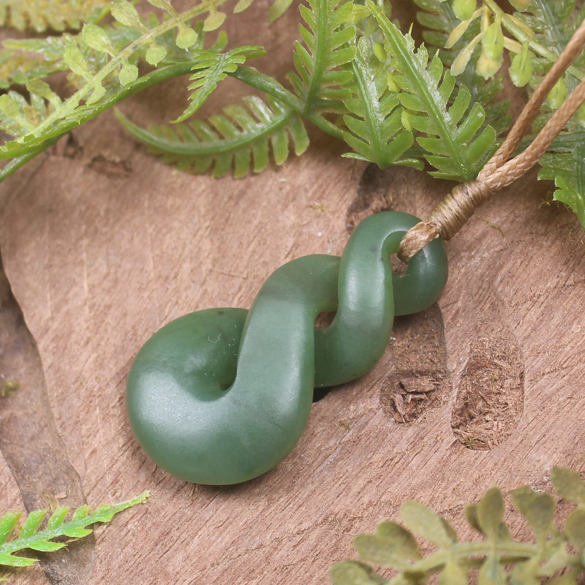 Twist or Pikorua carved from Hapopo Pounamu - NZ Greenstone