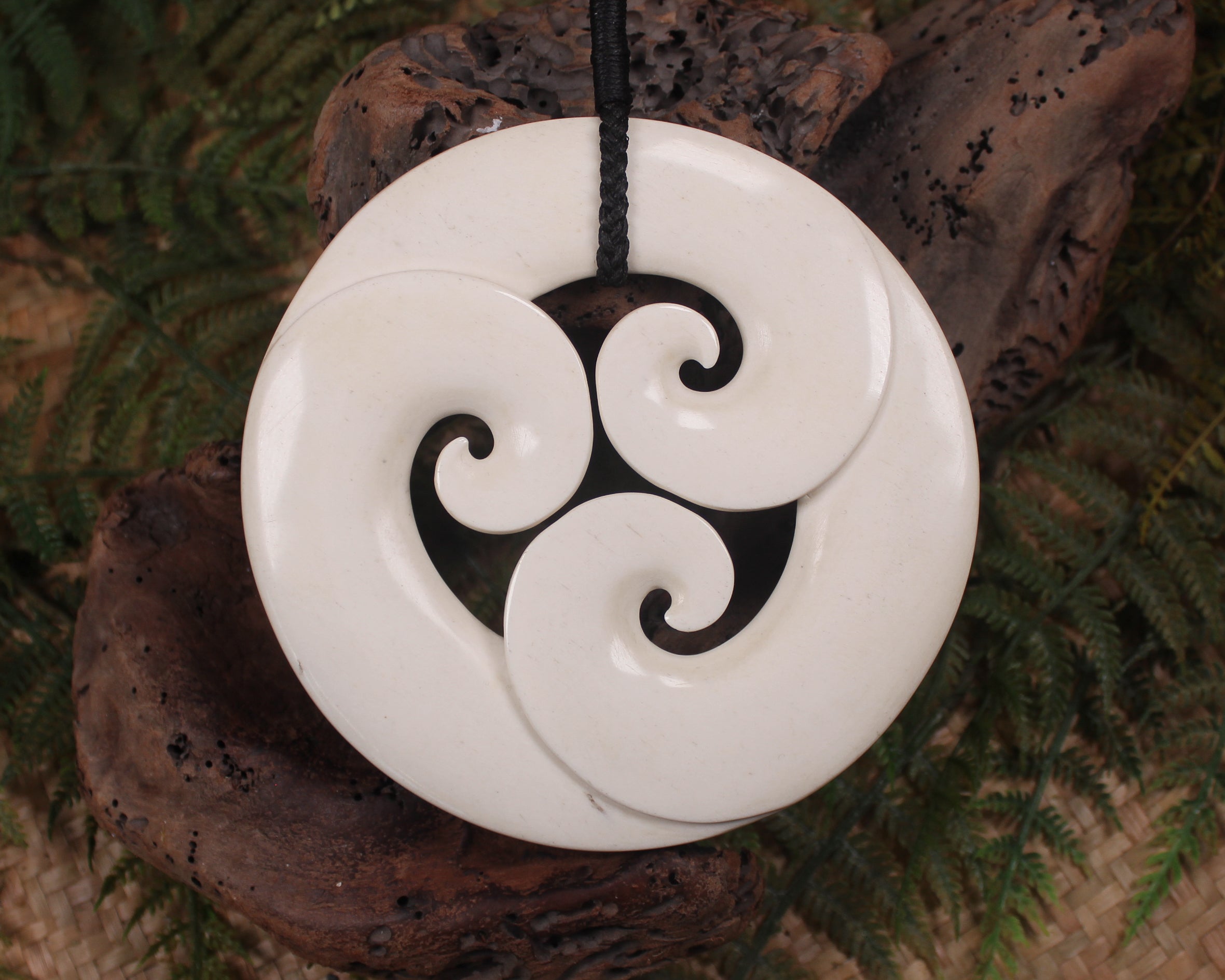 Koru sculpture carved from Whale Bone