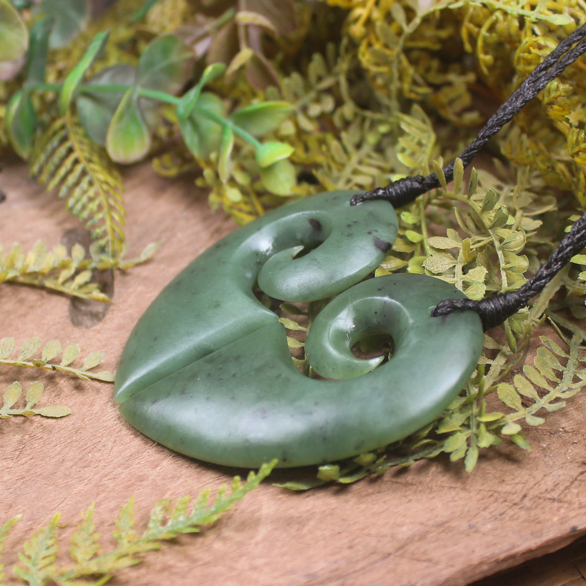 Koru Heart pendant carved from Hapopo Pounamu - NZ Greenstone