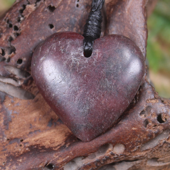 Heart carved from Rhodonite 
