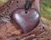 Heart carved from Rhodonite 