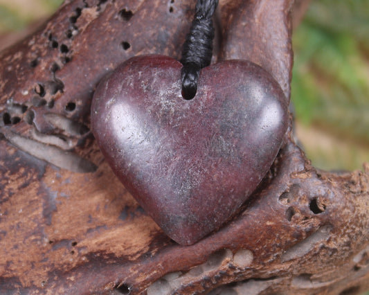 Heart carved from Rhodonite 