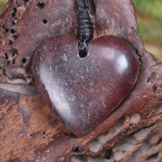Heart carved from Rhodonite 