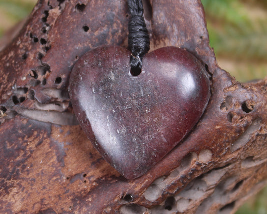 Heart carved from Rhodonite 