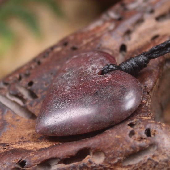 Heart carved from Rhodonite 