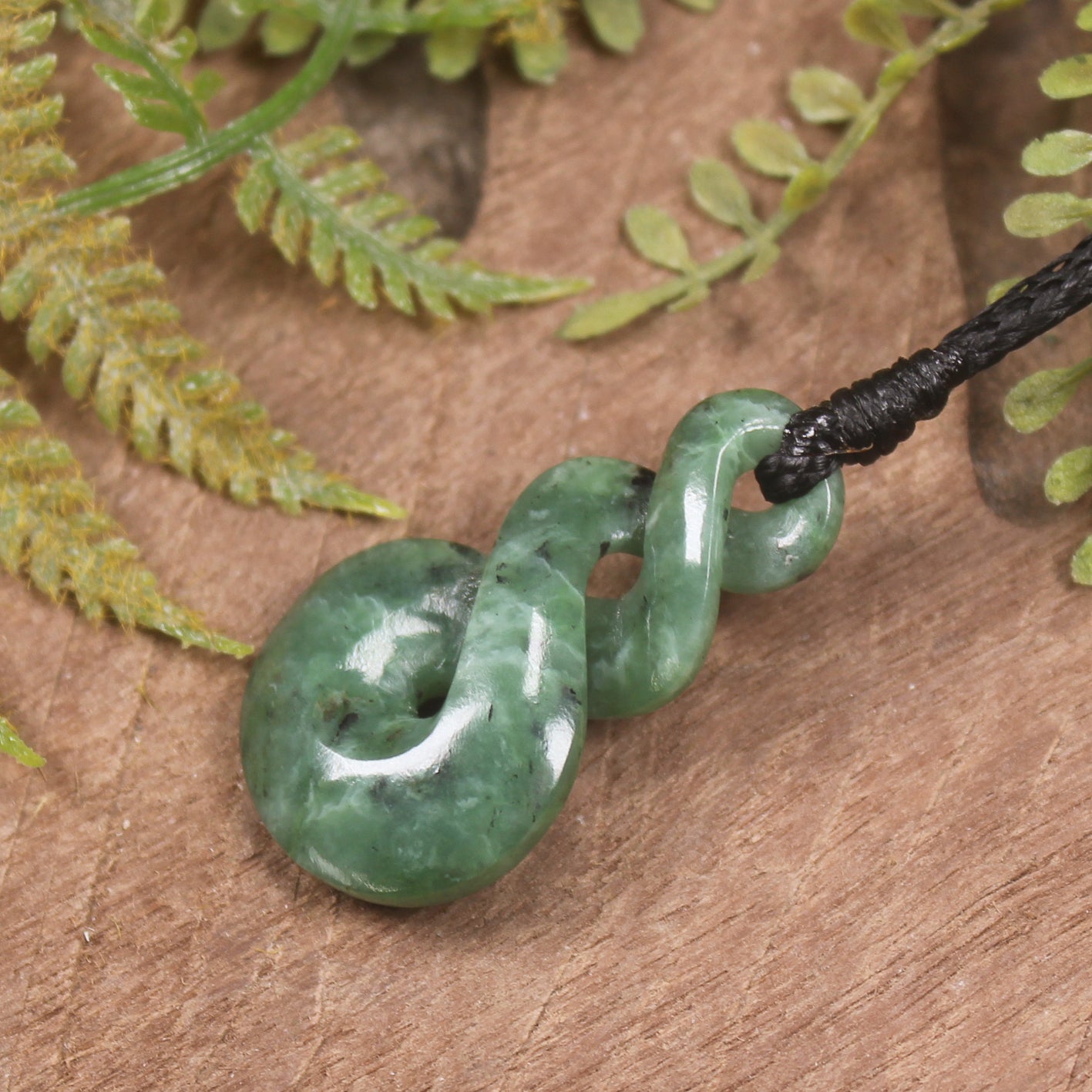 Twist or Pikorua carved from Hapopo Pounamu - NZ Greenstone