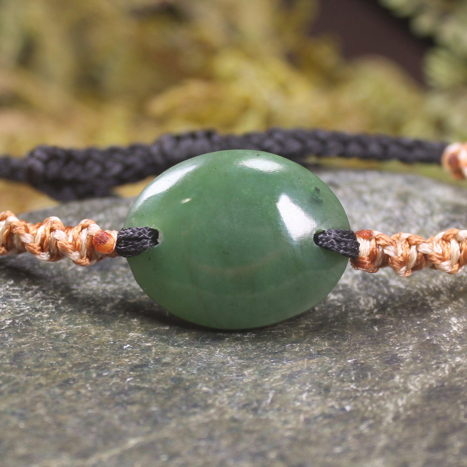 Adjustable cord bracelet with Hapopo Pounamu