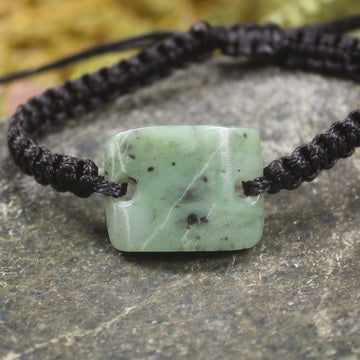 Adjustable cord bracelet with Hapopo Pounamu