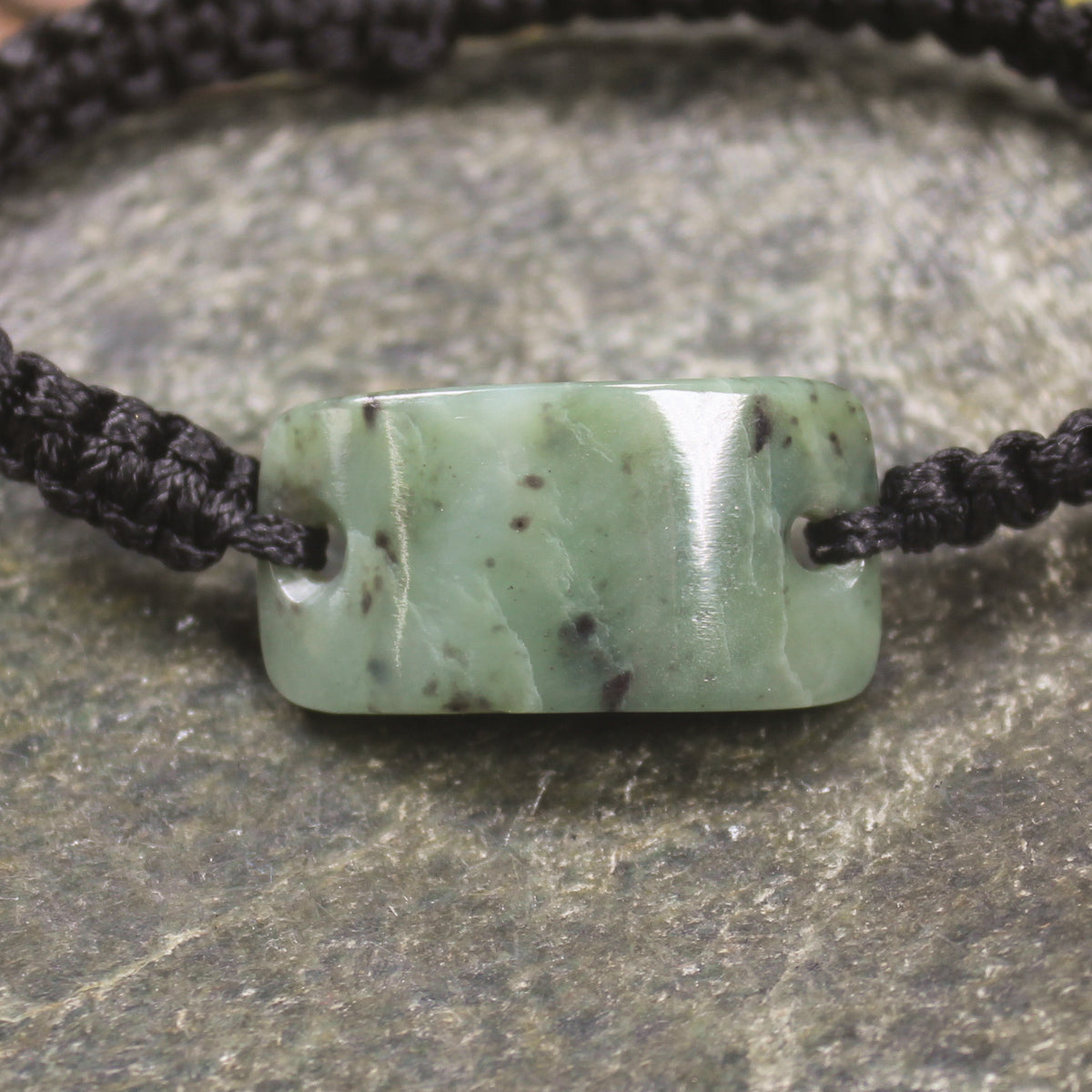 Adjustable cord bracelet with Hapopo Pounamu
