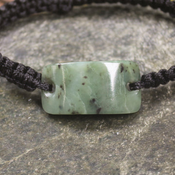 Adjustable cord bracelet with Hapopo Pounamu