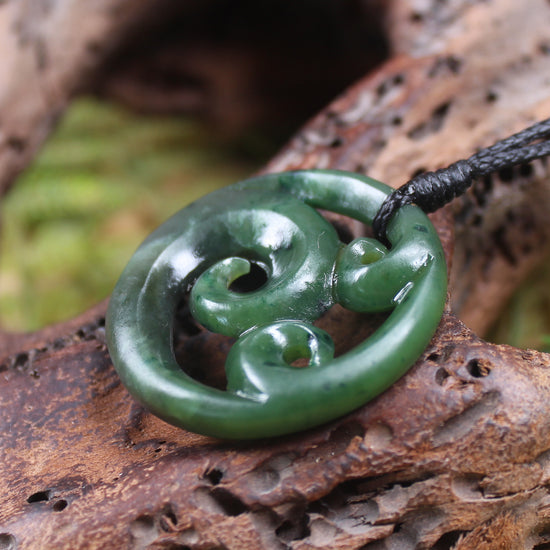 Koru pendant carved from Kawakawa Pounamu - NZ Greenstone