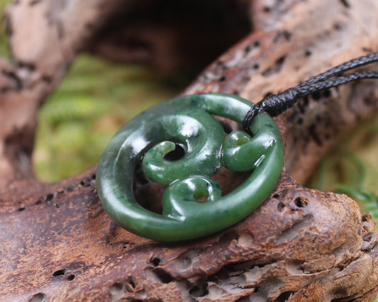 Koru pendant carved from Kawakawa Pounamu - NZ Greenstone