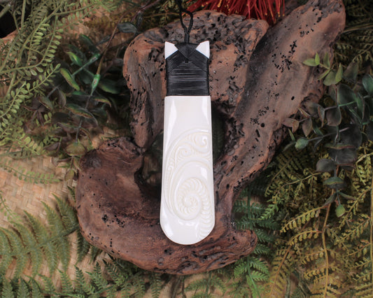 Toki or Adze with Koru carved from Beef Bone