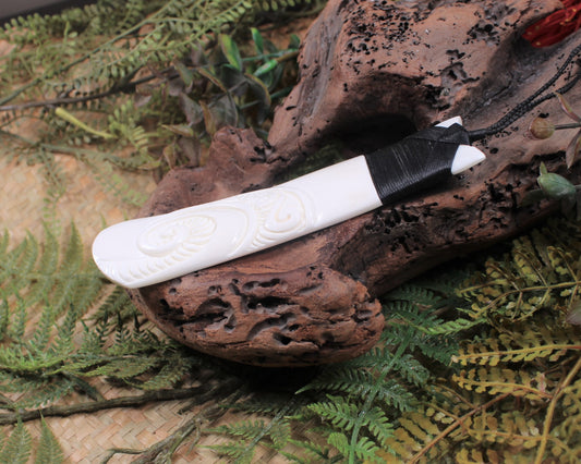 Toki or Adze with Koru carved from Beef Bone