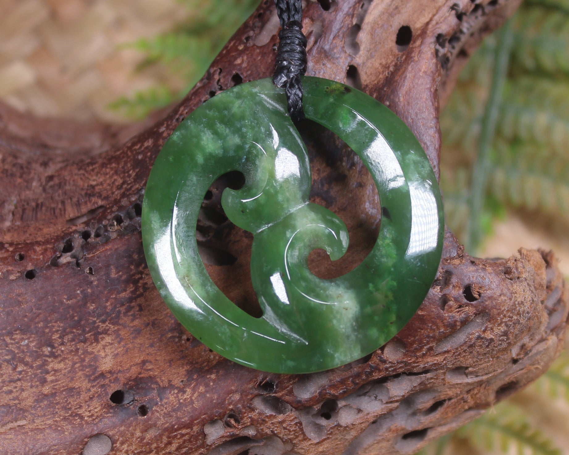 Koru pendant carved from Kawakawa Pounamu - NZ Greenstone