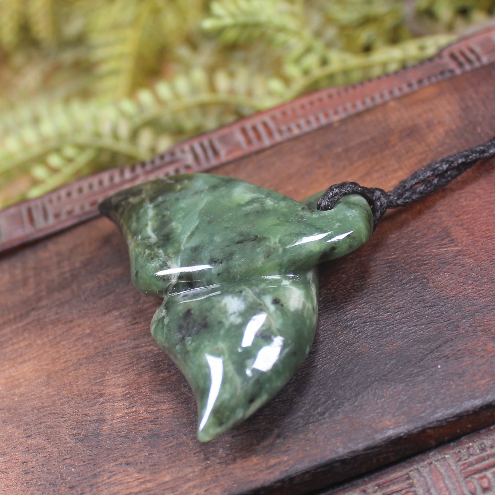 Whale tail carved from Hapopo Pounamu - NZ Greenstone