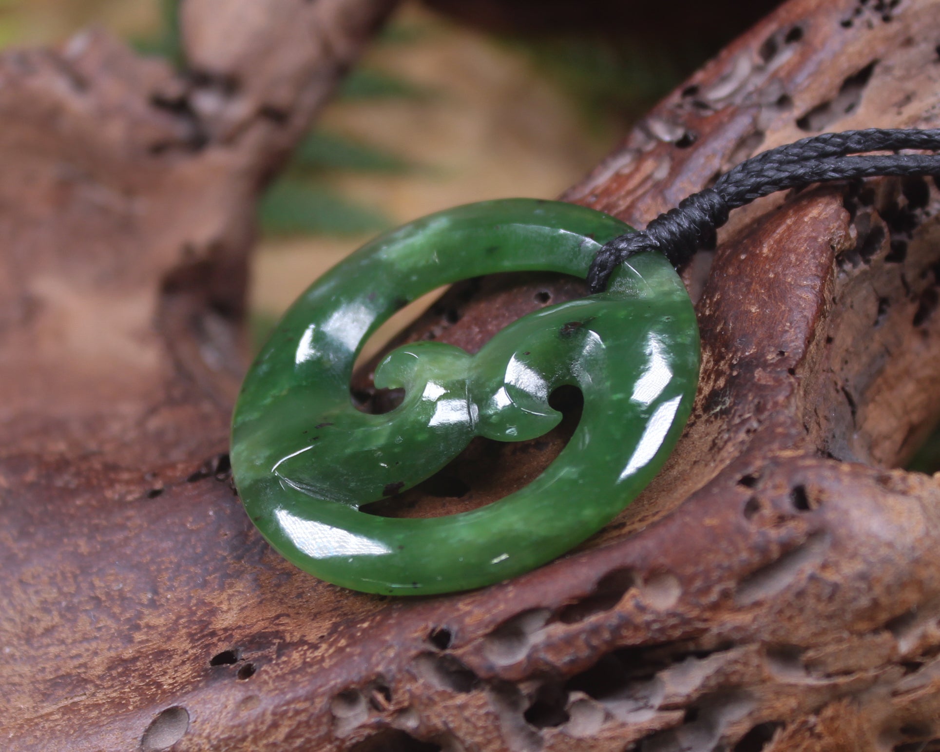 Koru pendant carved from Kawakawa Pounamu - NZ Greenstone