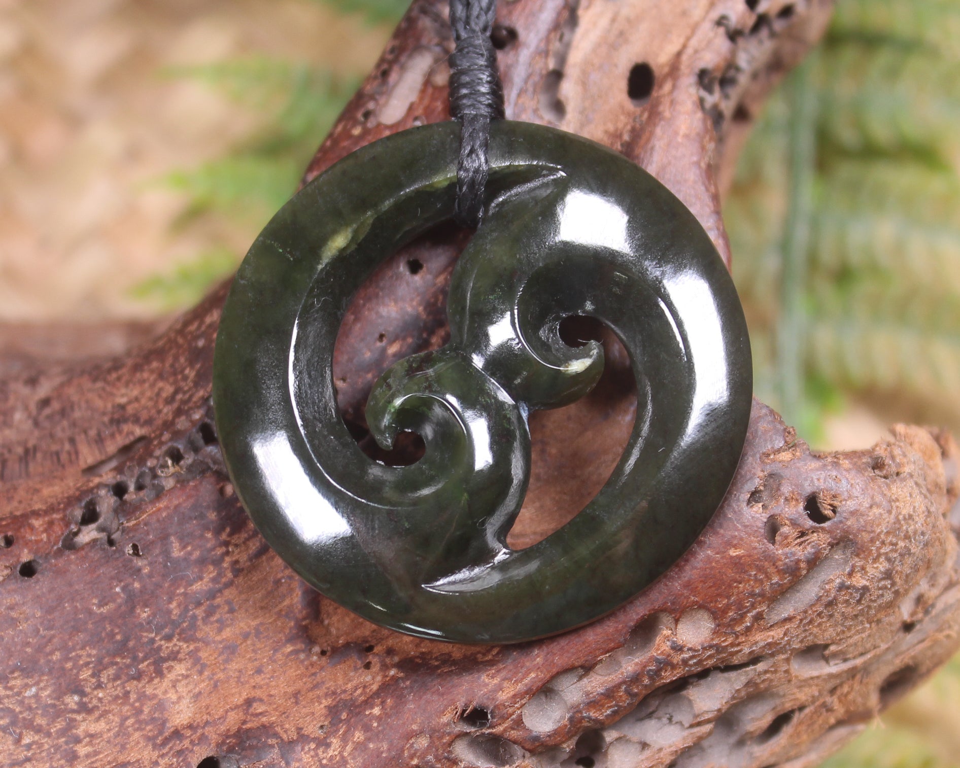 Koru carved from Rimu Pounamu - NZ Greenstone