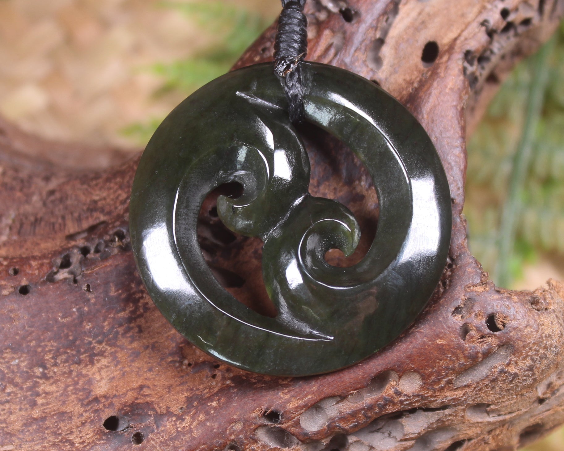 Koru carved from Rimu Pounamu - NZ Greenstone