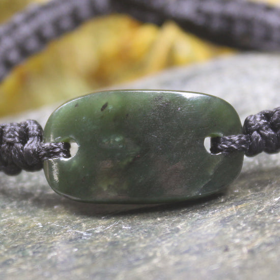 Adjustable cord bracelet with Rimu Pounamu