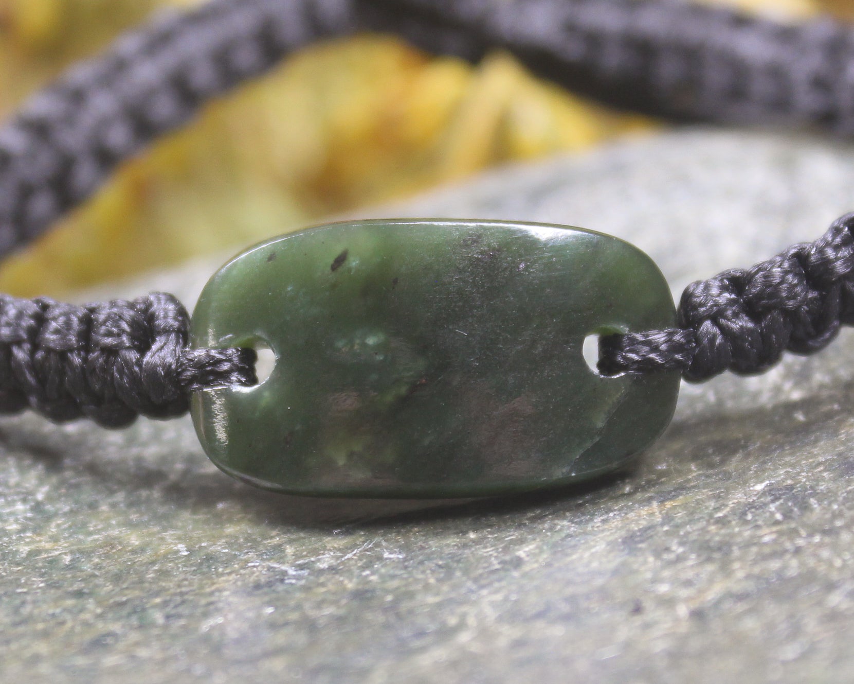 Adjustable cord bracelet with Rimu Pounamu