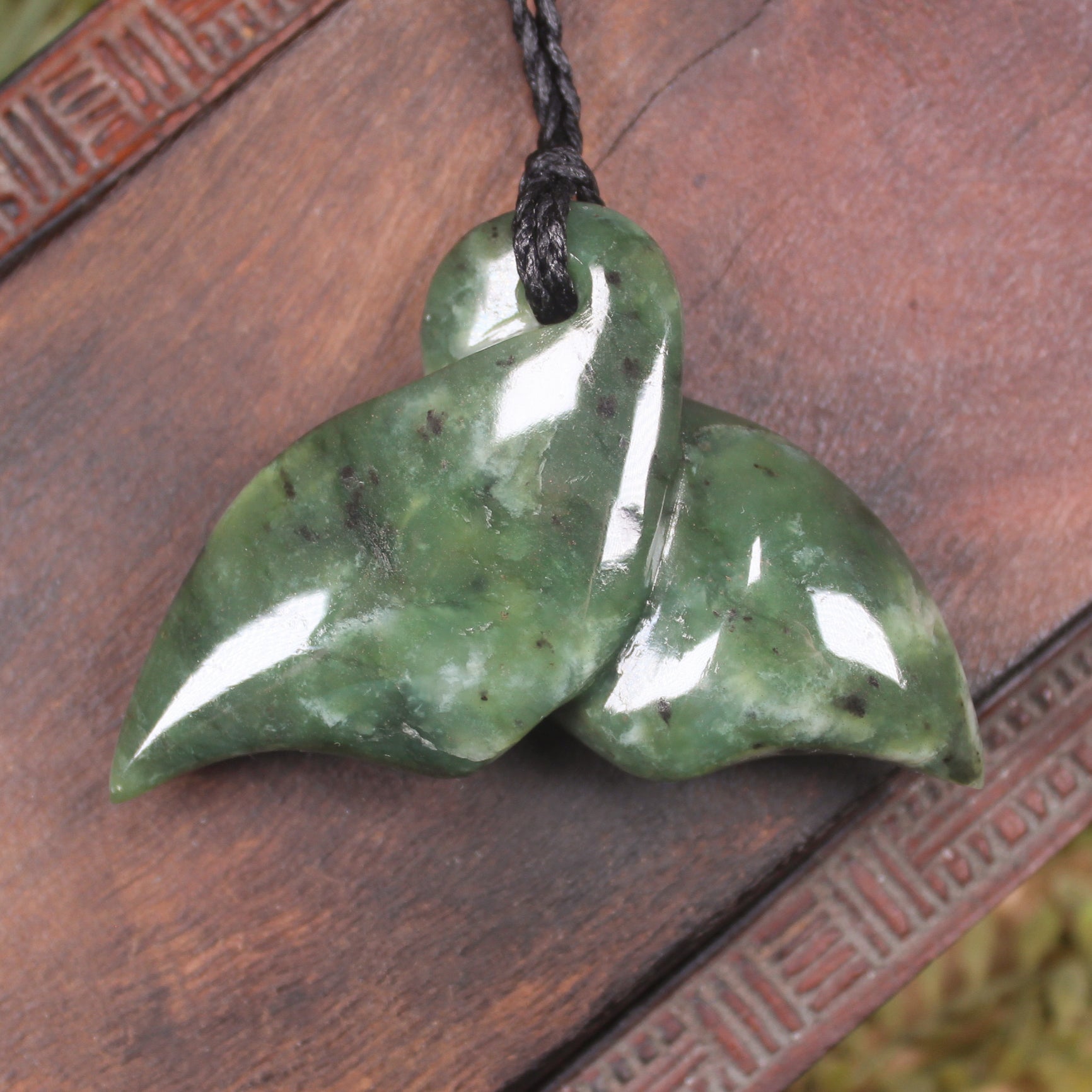 Whale tail carved from Hapopo Pounamu - NZ Greenstone