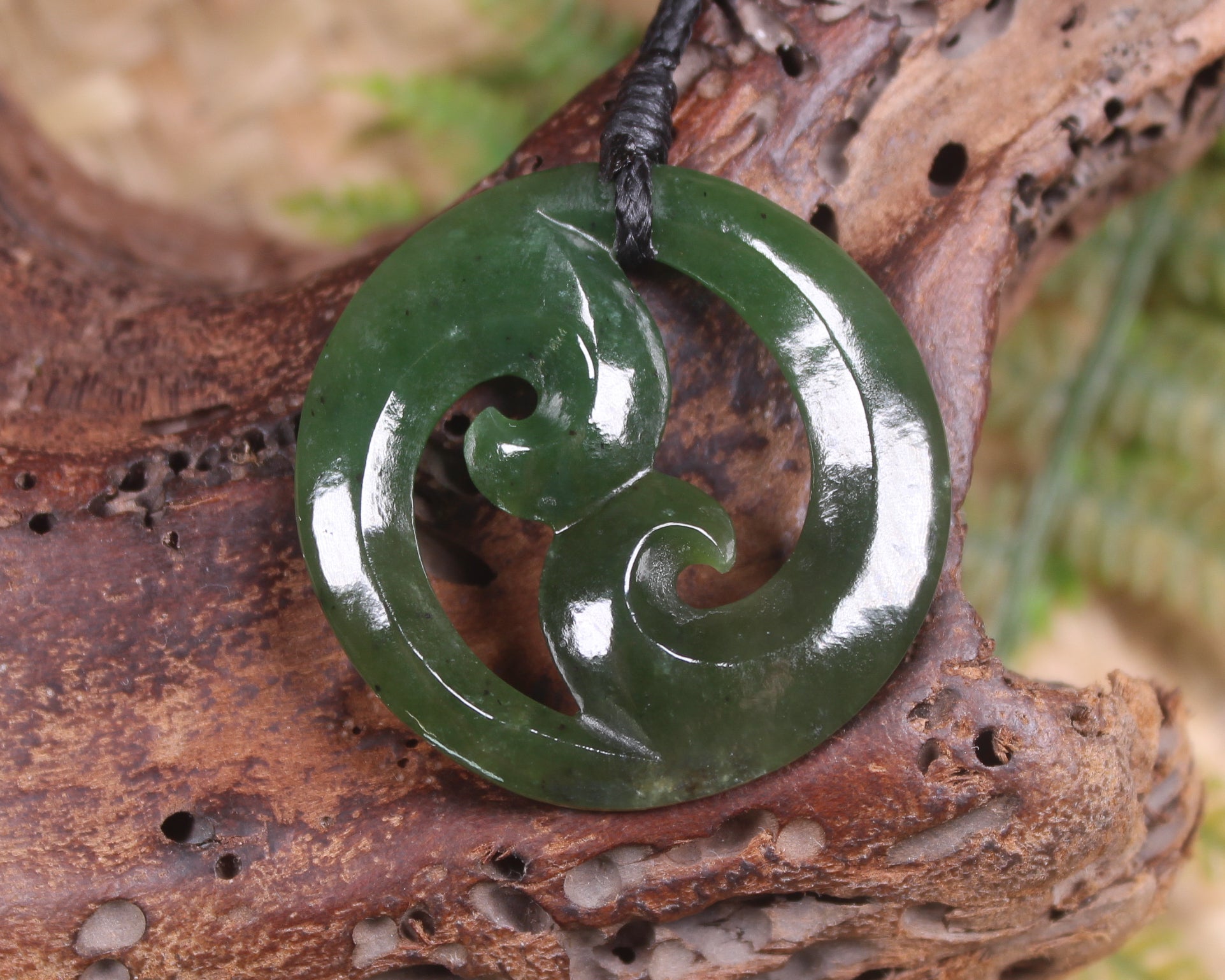 Koru pendant carved from Kawakawa Pounamu - NZ Greenstone