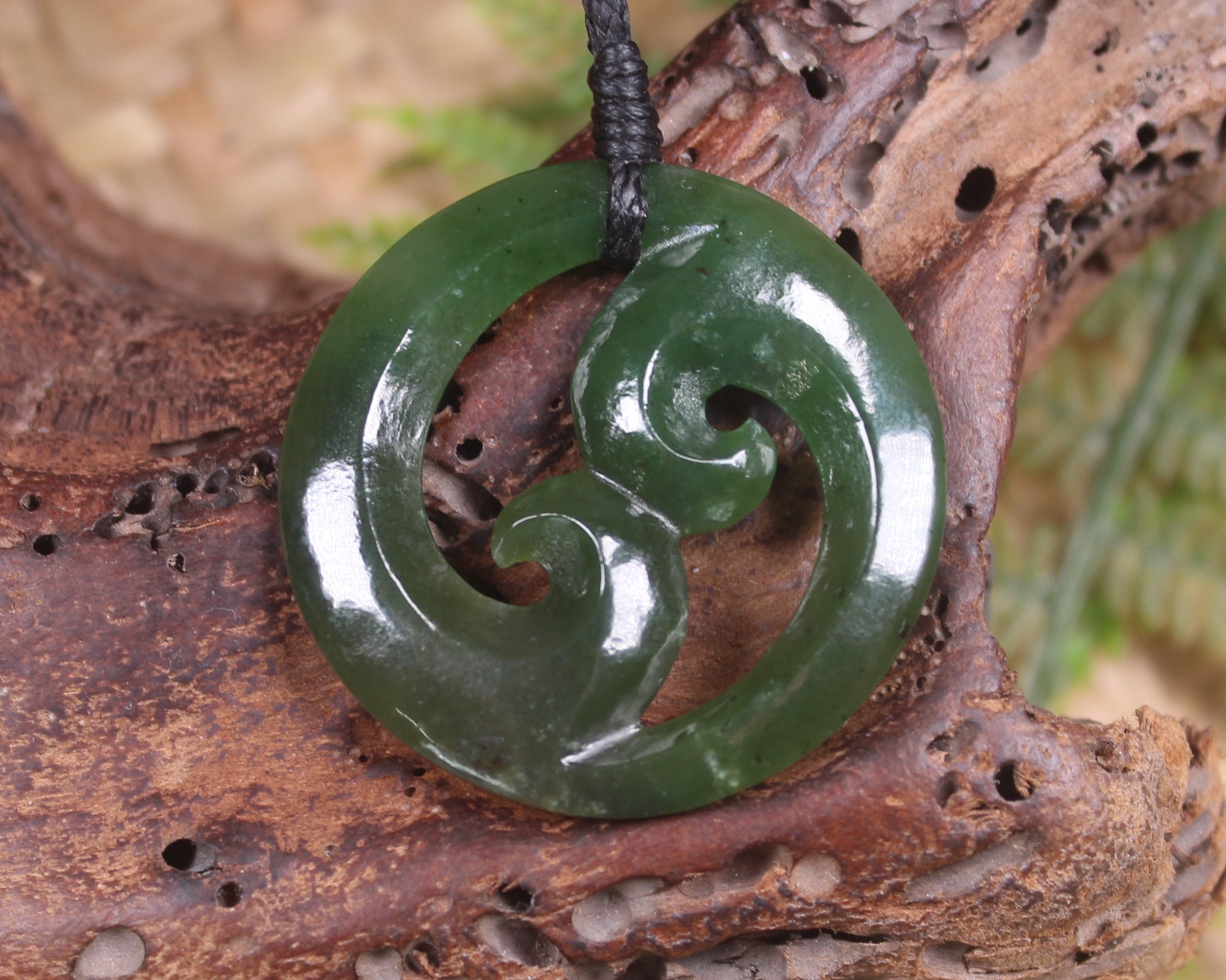 Koru pendant carved from Kawakawa Pounamu - NZ Greenstone