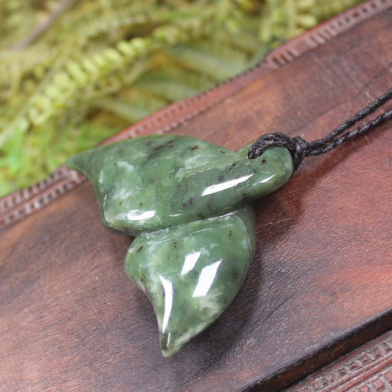 Whale tail carved from Hapopo Pounamu - NZ Greenstone