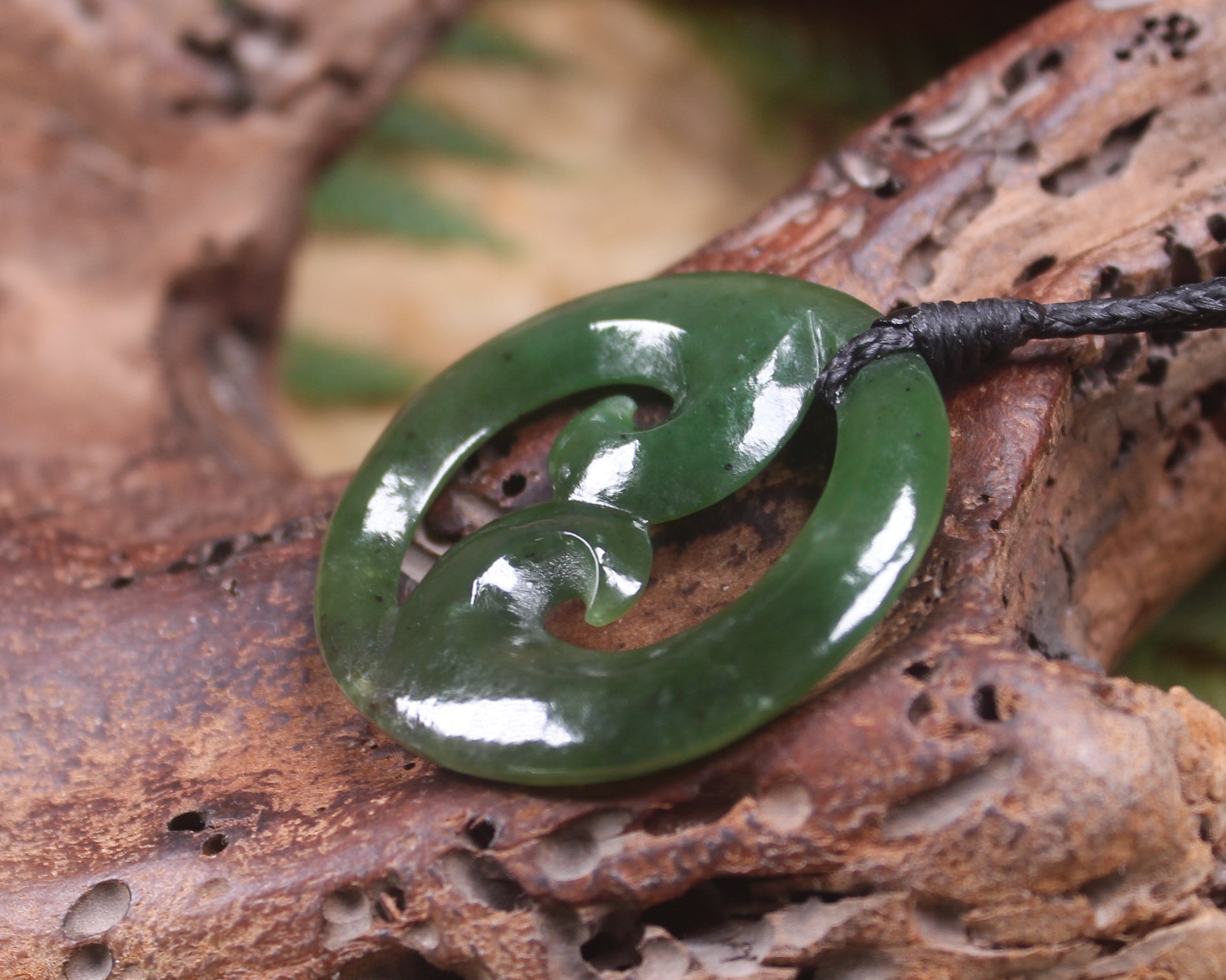 Koru pendant carved from Kawakawa Pounamu - NZ Greenstone