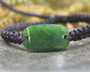 Adjustable cord bracelet with Hapopo Pounamu