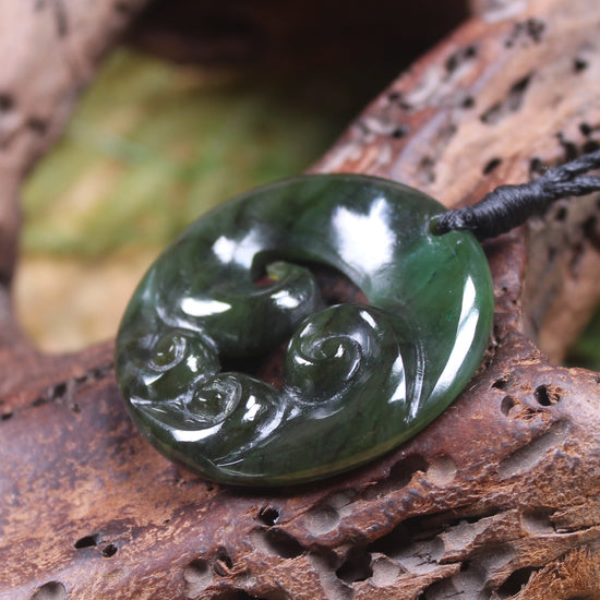 Koru carved from Rimu Pounamu - NZ Greenstone
