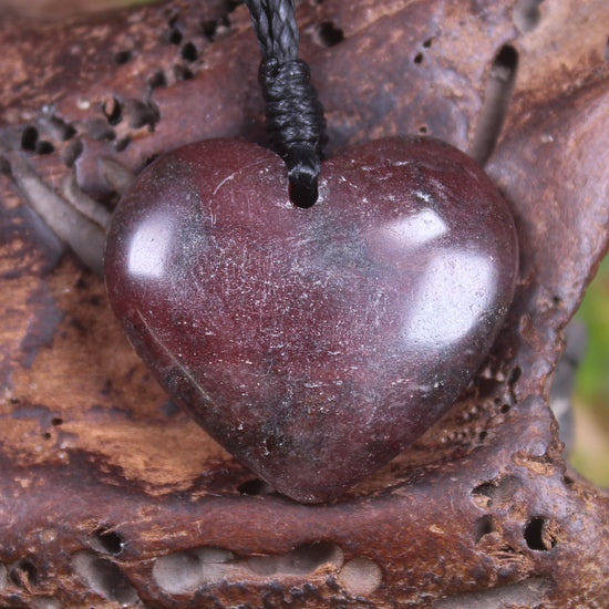 Heart carved from Rhodonite 
