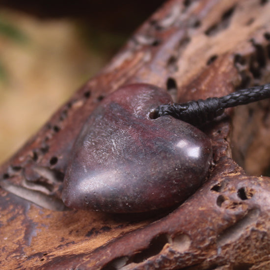 Heart carved from Rhodonite 