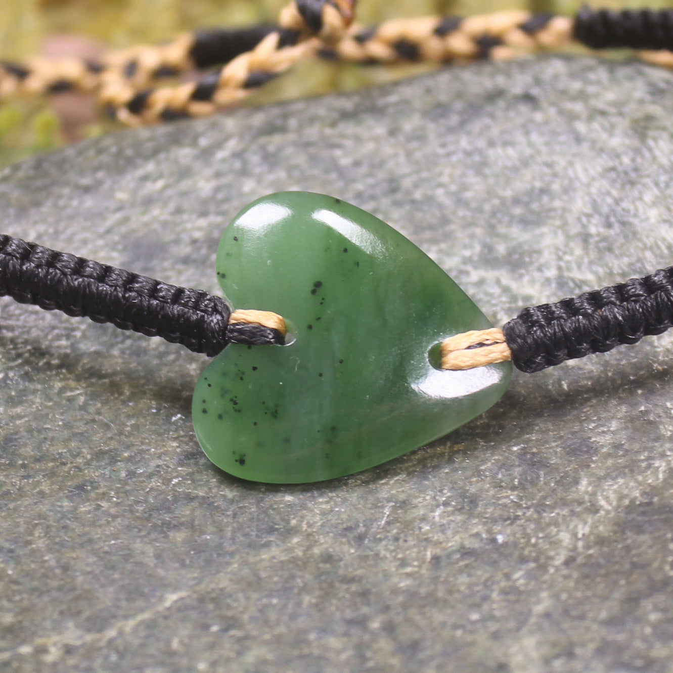 Adjustable cord bracelet with Hapopo Pounamu