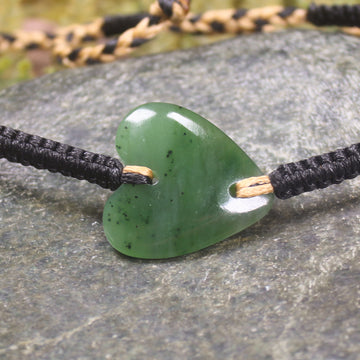 Adjustable cord bracelet with Hapopo Pounamu