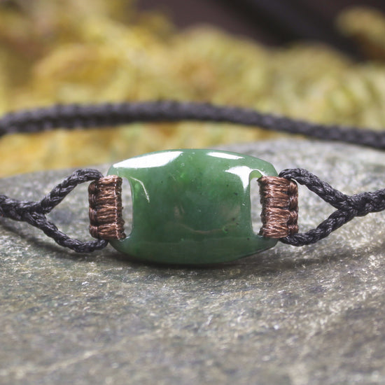 Adjustable cord bracelet with Hapopo Pounamu