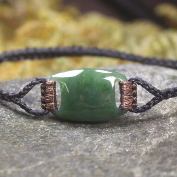 Adjustable cord bracelet with Hapopo Pounamu