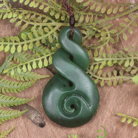 Koru Twist carved from Kawakawa Pounamu - NZ Greenstone