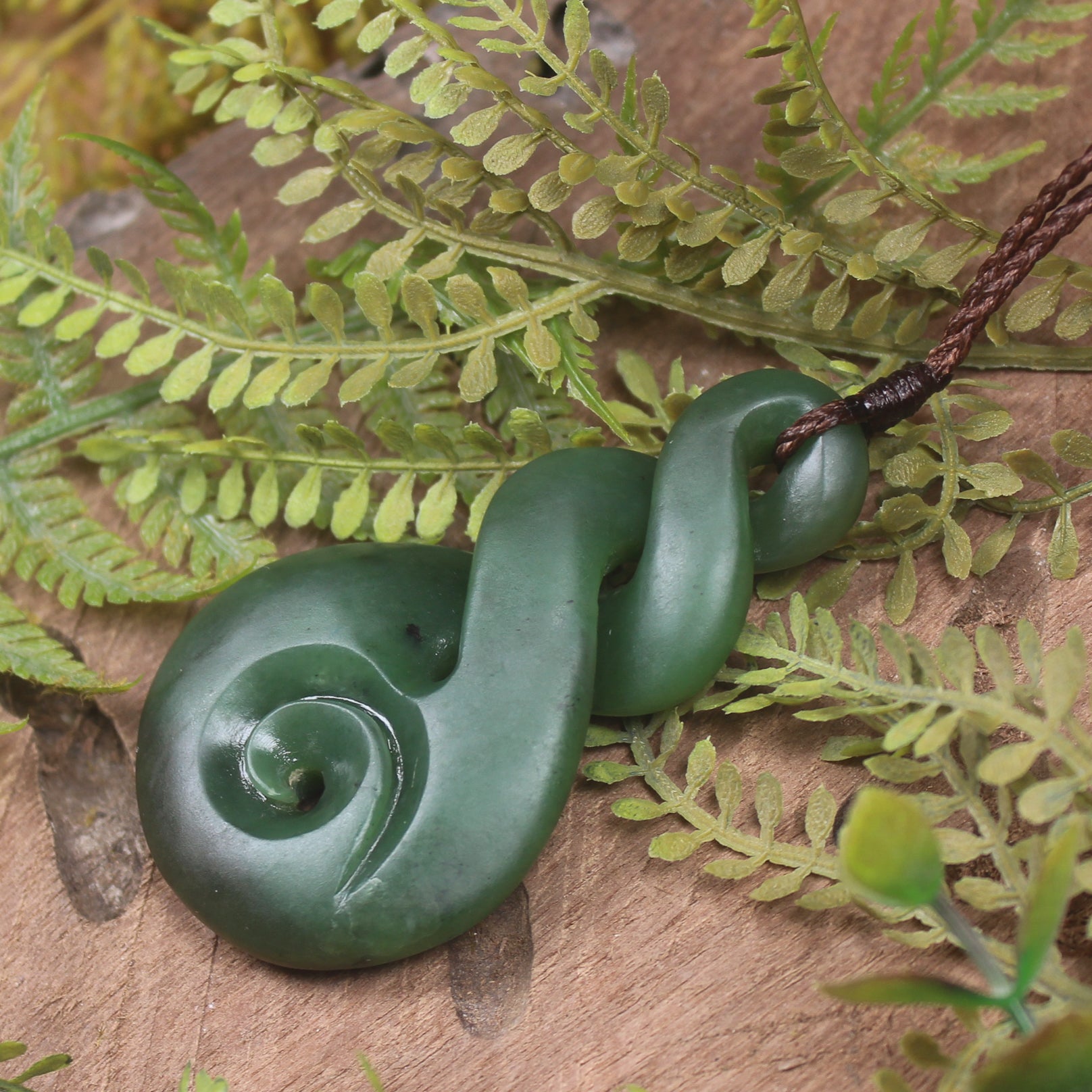 Koru Twist carved from Kawakawa Pounamu - NZ Greenstone
