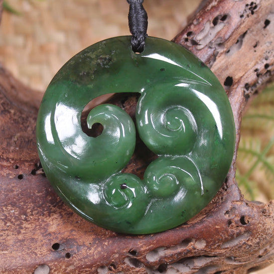 Koru pendant carved from Kawakawa Pounamu - NZ Greenstone