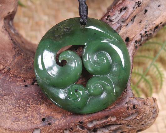 Koru pendant carved from Kawakawa Pounamu - NZ Greenstone